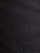 Close-up of black textured denim fabric with fine dotted weave pattern – Wam Denim.