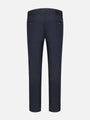 Back view of navy slim-fit chinos with buttoned welt pockets and belt loops – Wam Denim.