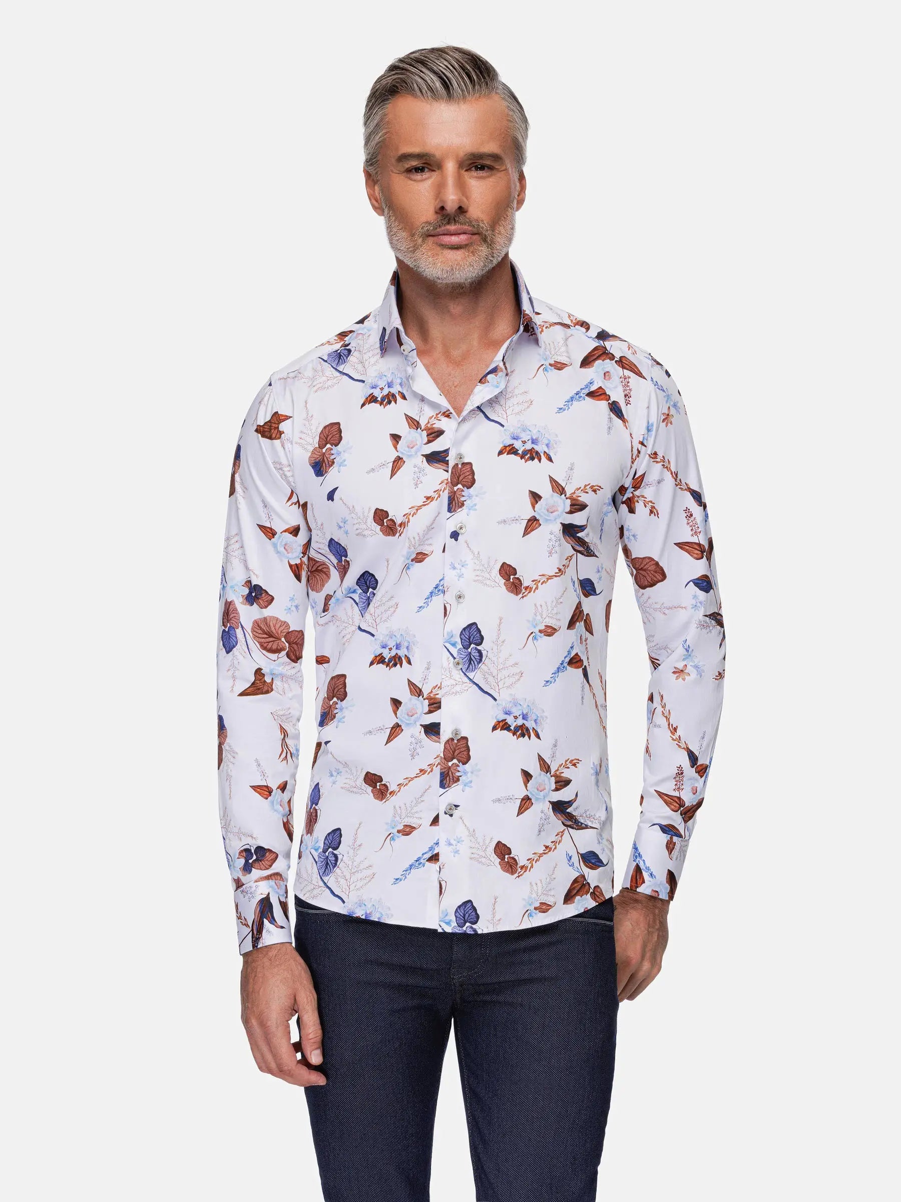 Man wearing white floral long-sleeve shirt with blue and brown prints – Wam Denim.