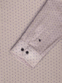 Close-up of beige shirt cuff with purple dot pattern. – Wam Denim.