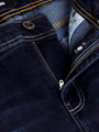 Close-up of dark navy denim jeans zipper and button detail with contrast stitching – Wam Denim.