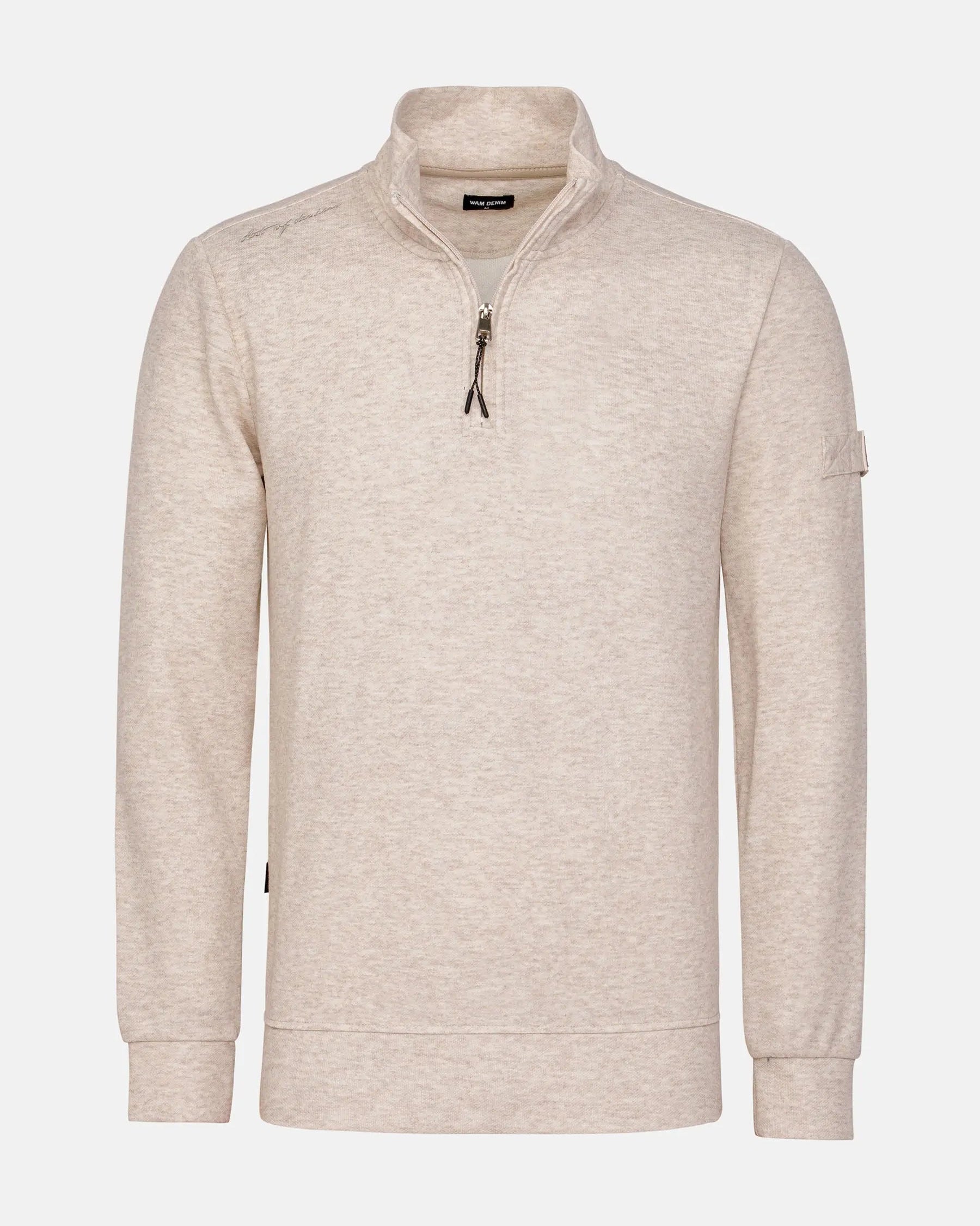 Beige half-zip sweatshirt on a white background