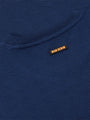 Close-up of navy Moorland Sweater with brand tag. – Wam Denim.