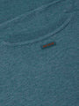 Close-up of back neck area with subtle Wam Denim logo tag on petrol fabric – Wam Denim.