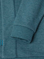 Cozy teal Rustic Petrol Sweater with textured knit and orange logo. – Wam Denim.