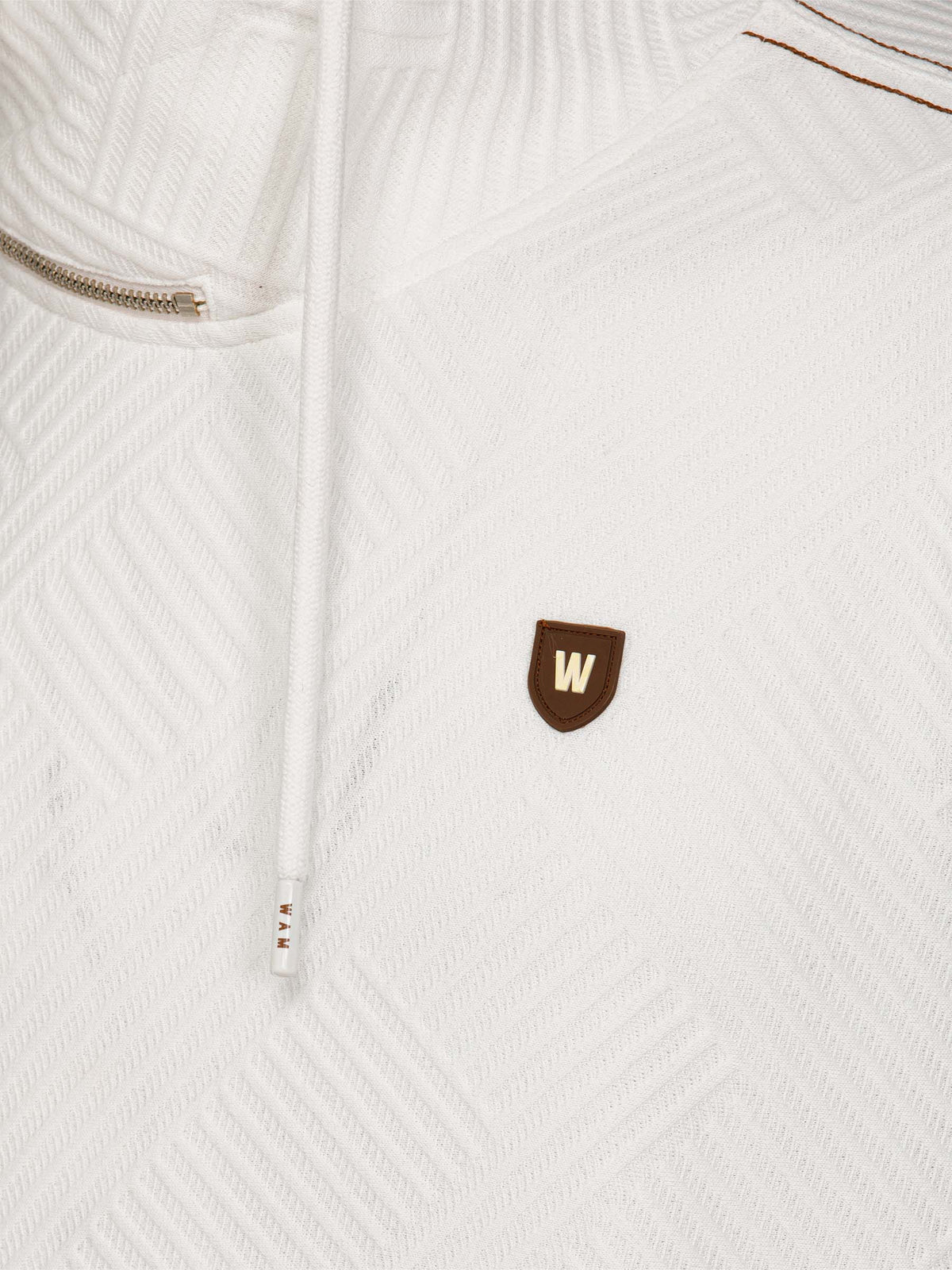 Close-up of white textured sweatshirt with drawstrings, zipper, and brown chest logo – Wam Denim.