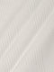 Close-up of white sweatshirt fabric featuring soft geometric textured pattern – Wam Denim.