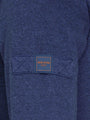 Close-up of Wam Denim Italy logo patch on sleeve of light indigo sweater – Wam Denim.