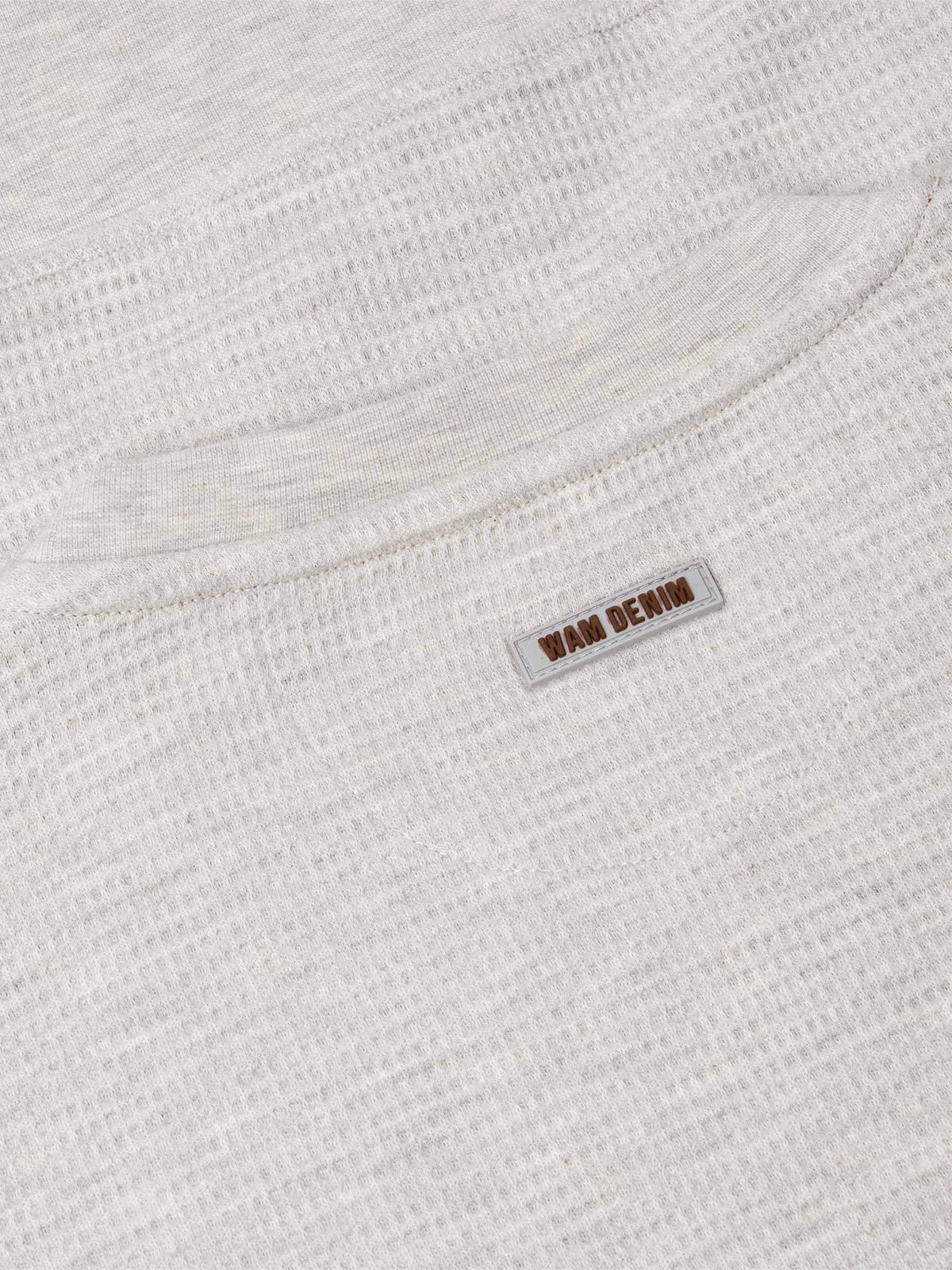Back neckline detail of light grey textured sweatshirt with Wam Denim logo tag – Wam Denim.