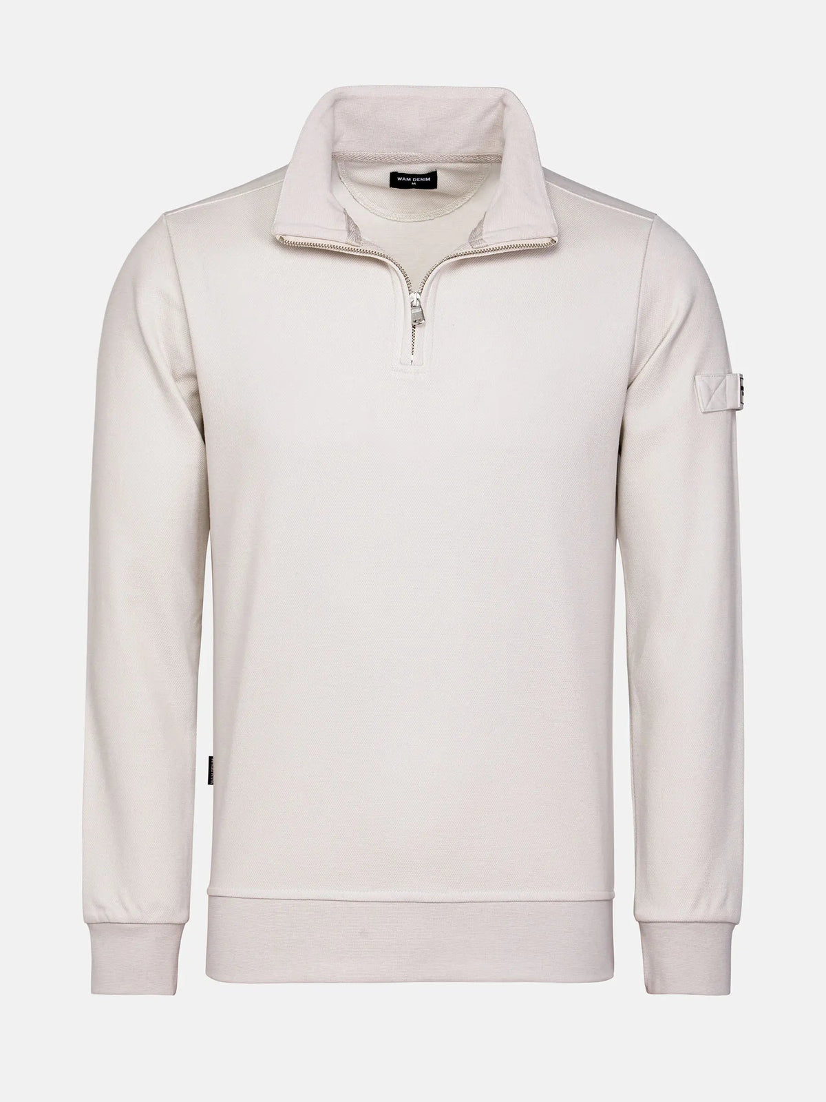 Close-up of light beige Milburn Sweater with stitching. – Wam Denim.