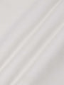 Close-up of light beige Milburn Sweater with zipper. – Wam Denim.