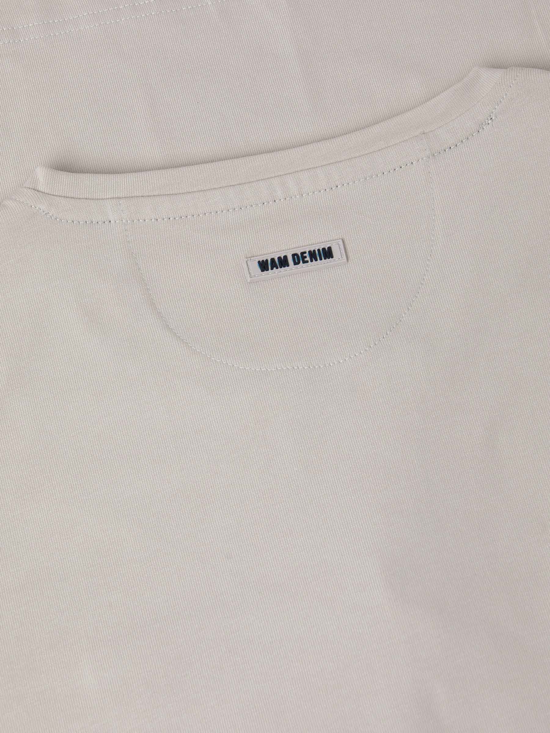 Close-up of The Fervor Light Beige Sweater back collar showing stitched Wam Denim label – Wam Denim.