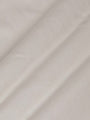 Close-up of The Fervor Light Beige Sweater fabric showing smooth, soft cotton texture – Wam Denim.