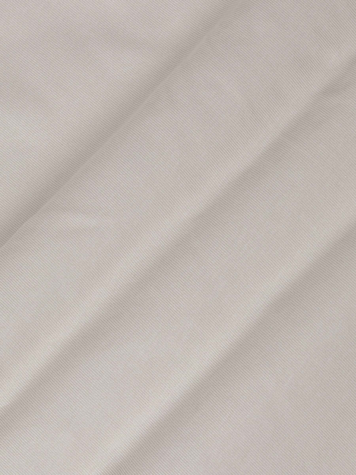 Close-up of The Fervor Light Beige Sweater fabric showing smooth, soft cotton texture – Wam Denim.