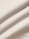 Light beige chino fabric close-up showing smooth cotton texture and premium weave.