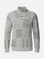 Light grey men’s knitwear sweater with textured patchwork design and buttoned high collar.