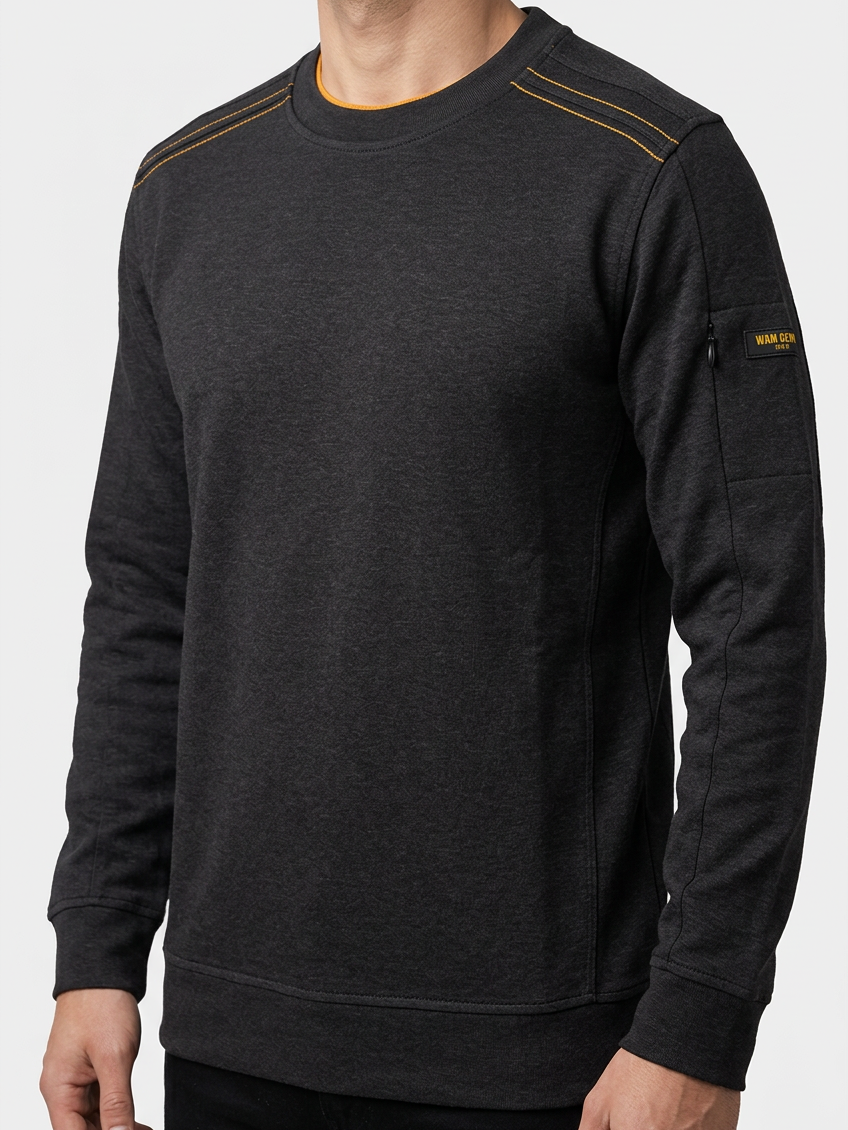 Daelor Black sweater shoulder stitching and sleeve badge detail on model