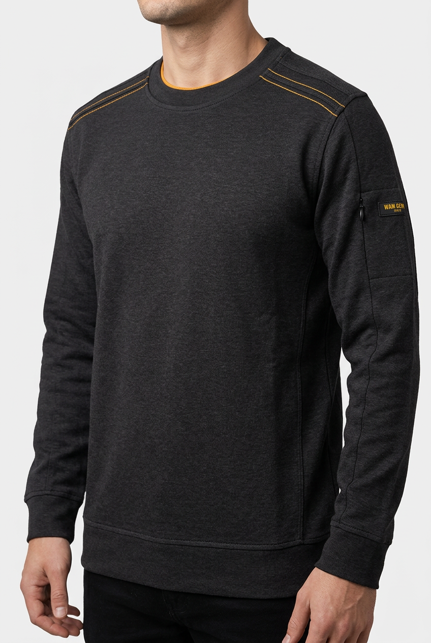 Daelor Black sweater shoulder stitching and sleeve badge detail on model