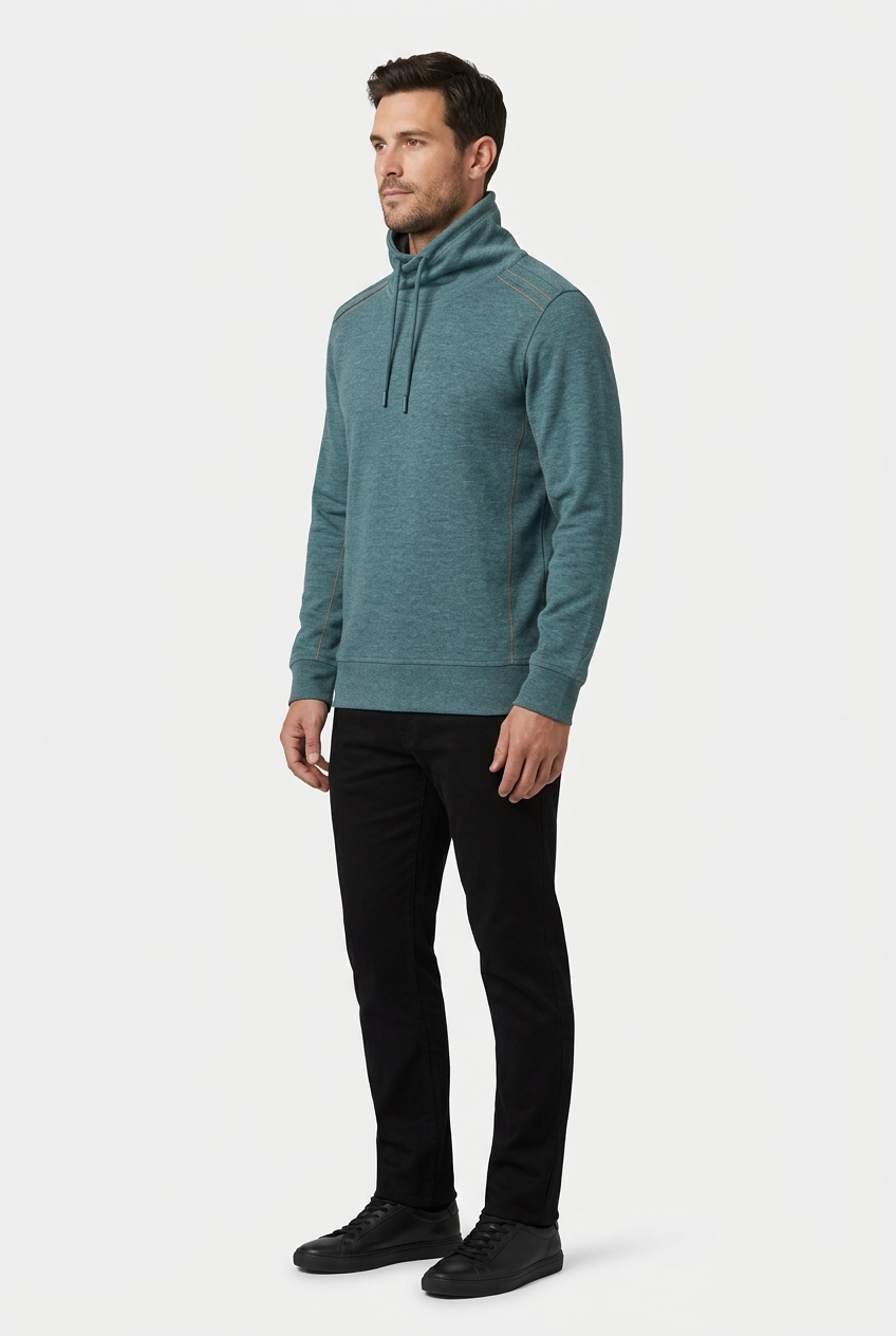 Malvik Petrol sweater on model, side view