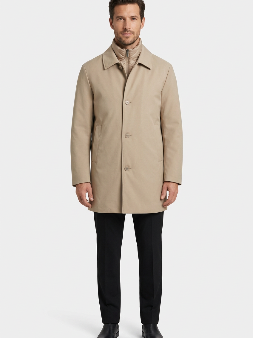 Model wearing beige coat, front view