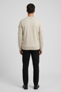 Onvik Beige sweater on model, back view