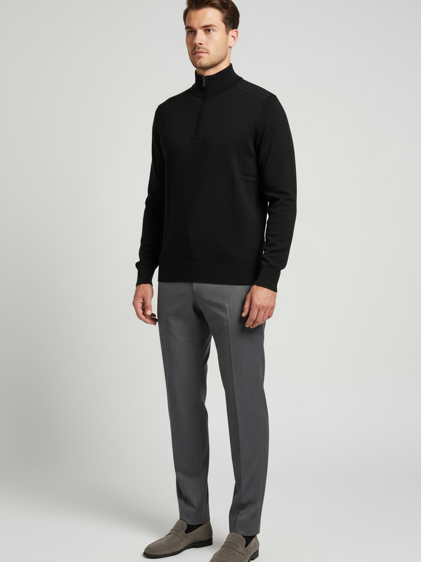Male model wearing the Sharp black quarter-zip sweater in a three-quarter view