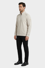 Nerik Light Beige sweater on model, side view
