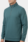 Nerik Petrol sweater quarter-zip and sleeve patch detail on model