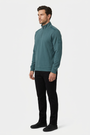 Nerik Petrol sweater on model, side view