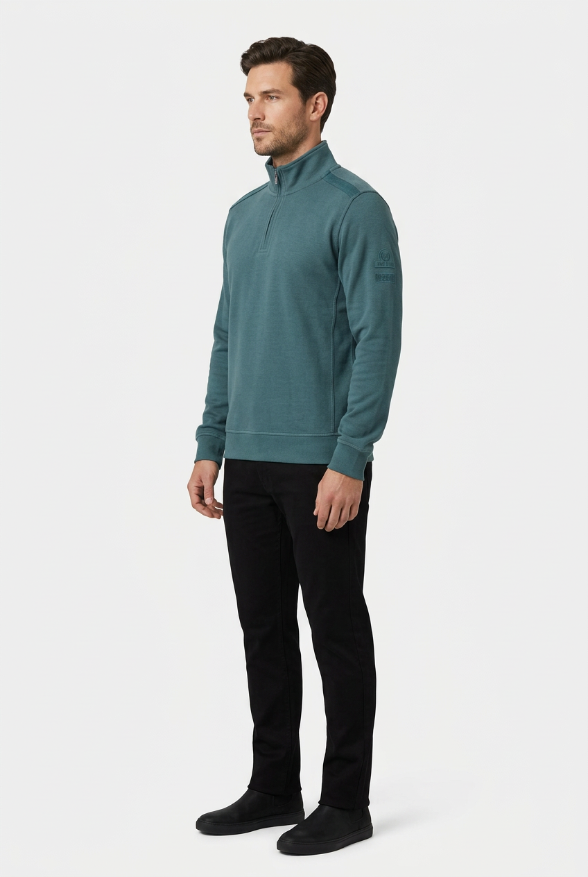 Nerik Petrol sweater on model, side view