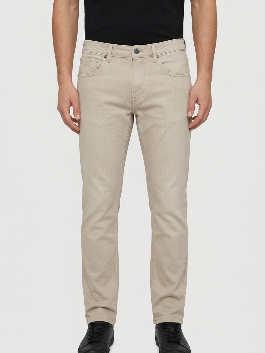 Grelix Light Beige jeans on model, front view