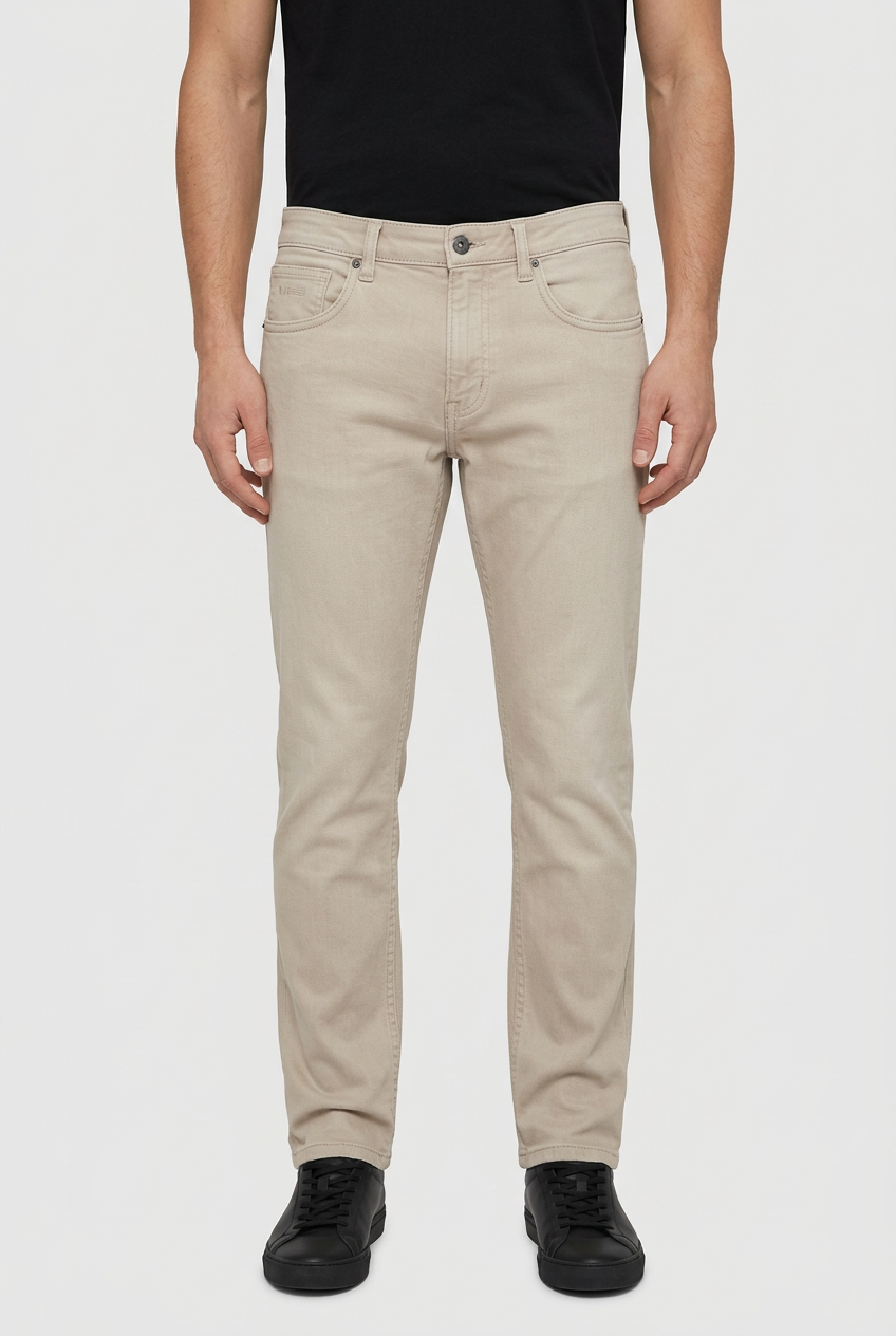 Grelix Light Beige jeans on model, front view