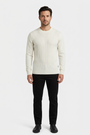 Poise Off White pullover on model, front view