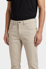 Grelix Light Beige jeans waistband and pocket detail on model