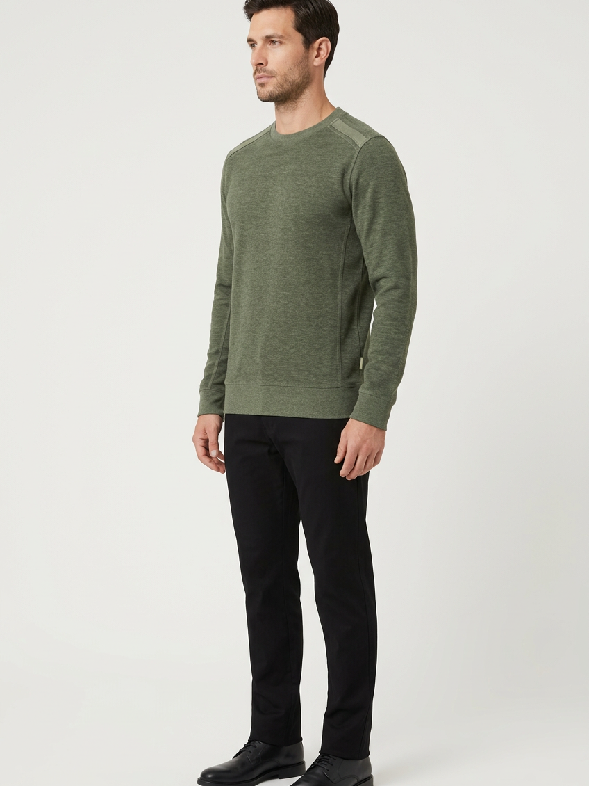 Vurden Dark Green sweater on model, side view