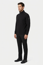 Nerik Black sweater on model, side view