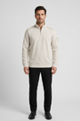 Nerik Light Beige sweater on model, front view