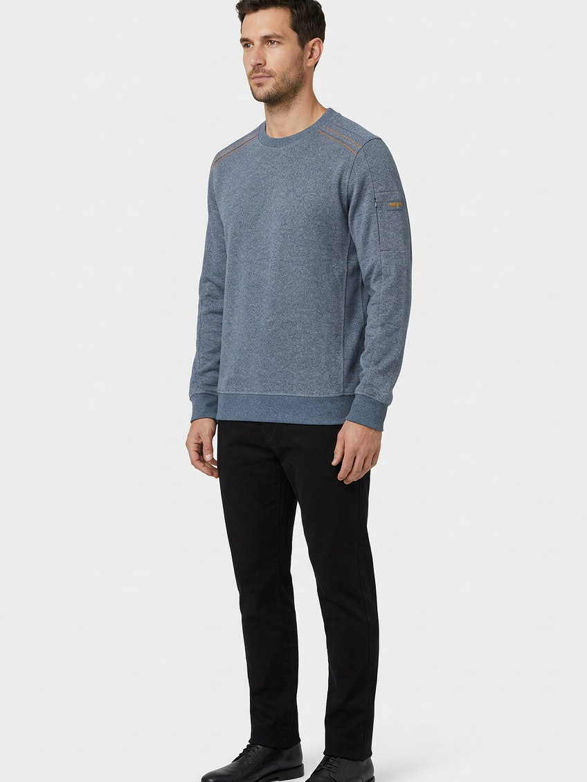 Daelor Blue sweater on model, side view