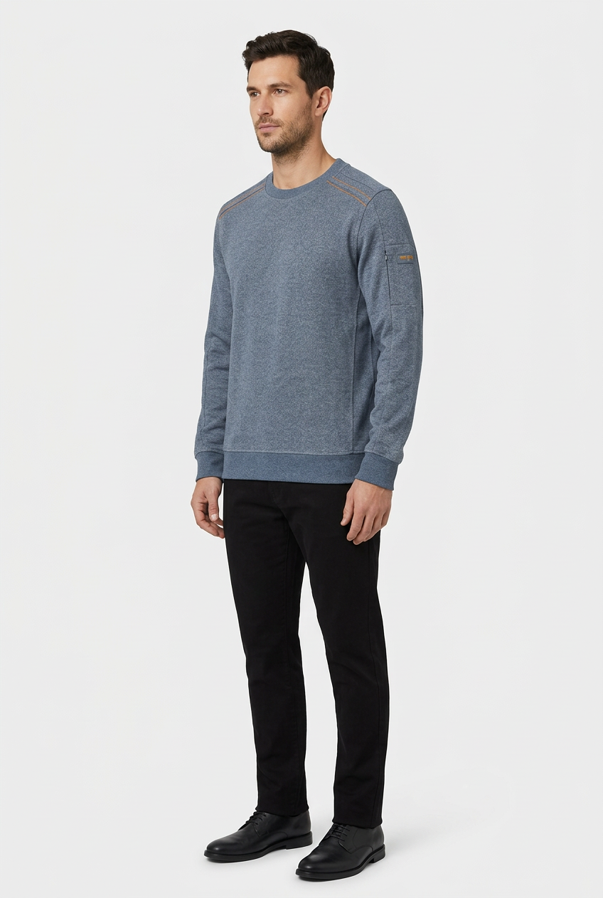 Daelor Blue sweater on model, side view