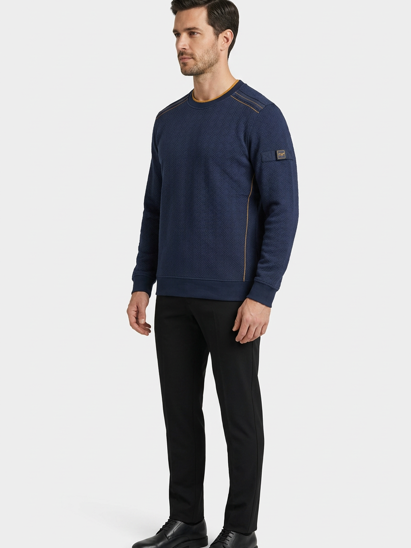 Thuron Navy sweater on model, side view