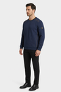 Thuron Navy sweater on model, side view