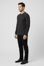 Daelor Black sweater on model, side view