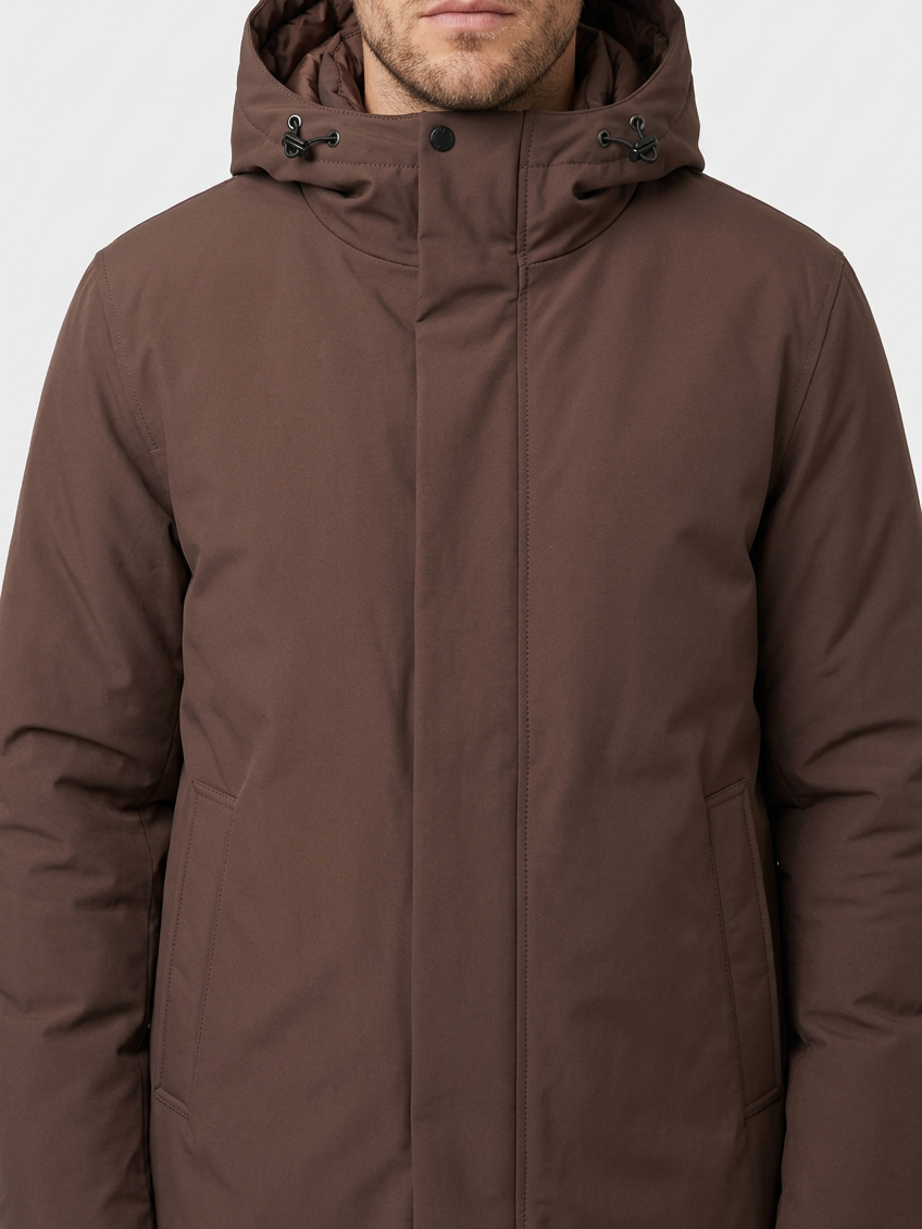 Hudson Brown winter jacket hood and zipper detail on model