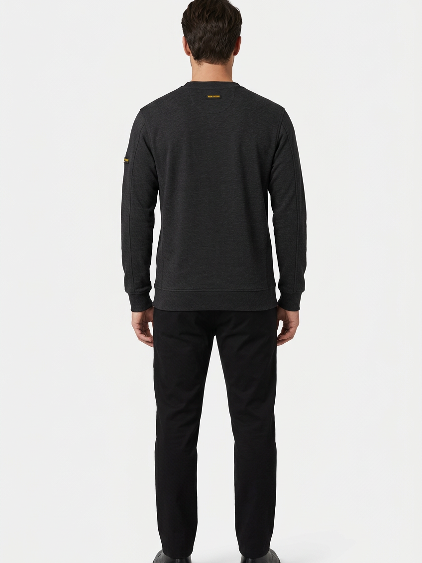 Daelor Black sweater on model, back view