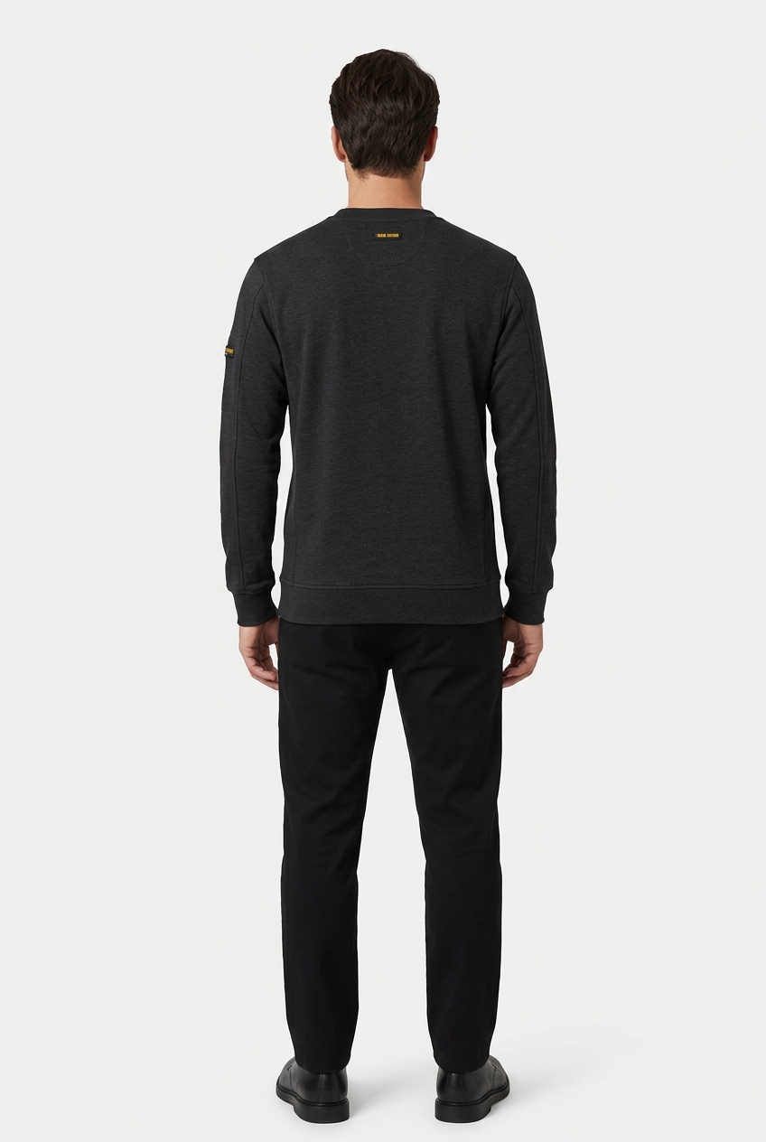 Daelor Black sweater on model, back view