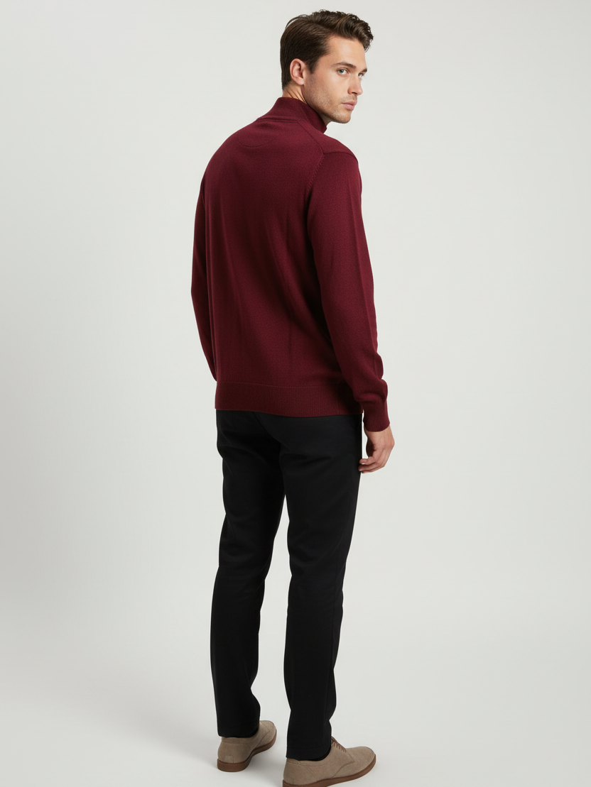 Back view of a male model wearing the Lux dark-red sweater with Wam Denim neck branding