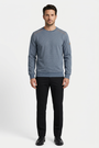 Daelor Blue sweater on model, front view