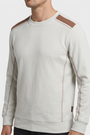Vurden Grey sweater shoulder panels and stitching detail on model