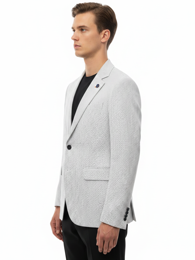 Side profile - white textured blazer on model
