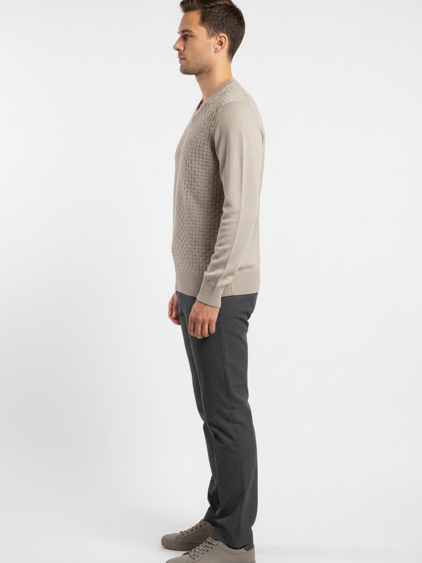 Side view of a male model wearing the Wam Denim Forge beige V-neck sweater